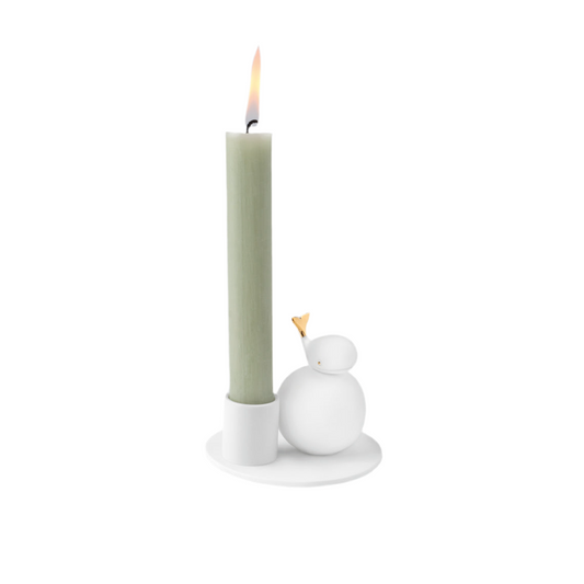 Porcelain candle holder with whale figure by räder design as an eye-catcher
