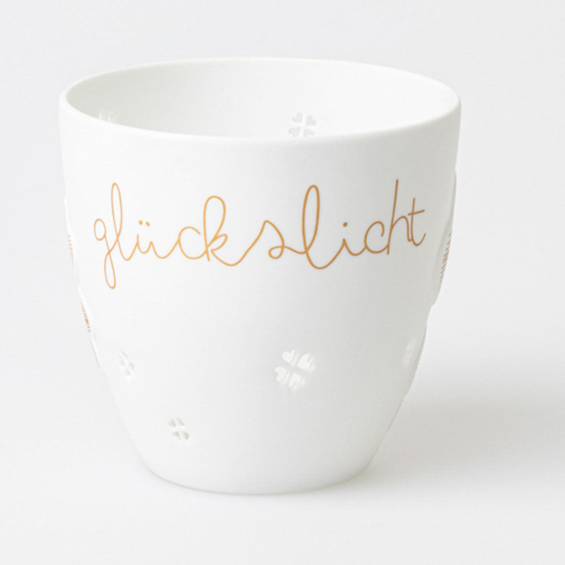 feiner Teelichthalter aus Porzellan " Glückslicht " von räder design