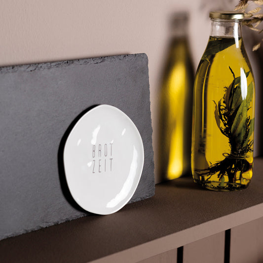 Teller klein aus Porzellan " Brotzeit " von räder design beschrifteter Teller