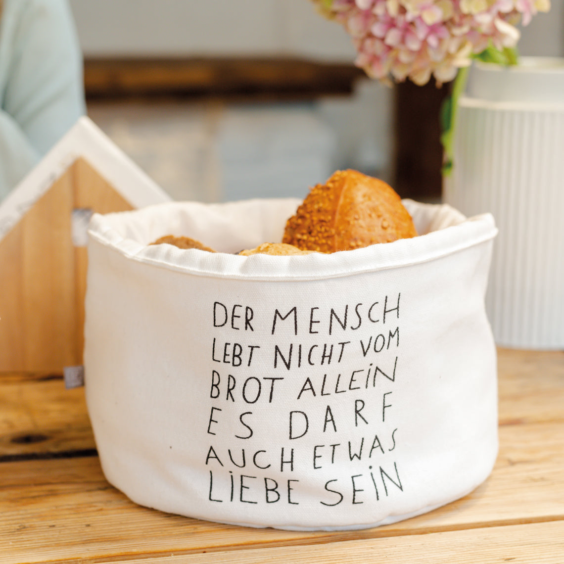 Brotkorb "Der Mensch lebt nicht vom Brot allein..." von räder