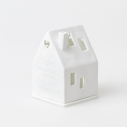 Lichthaus aus Porzellan " Liebe macht aus einem Haus ein Zuhause " von räder design