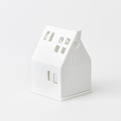 Lichthaus aus Porzellan " Liebe macht aus einem Haus ein Zuhause " von räder design