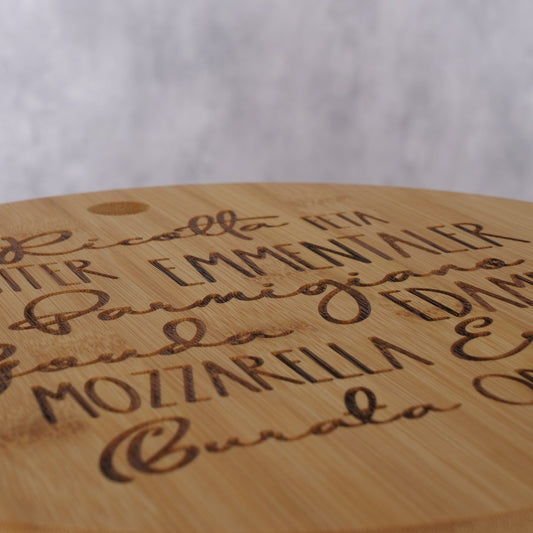 Schneidebrett aus Holz rund "Käse" von Boltze